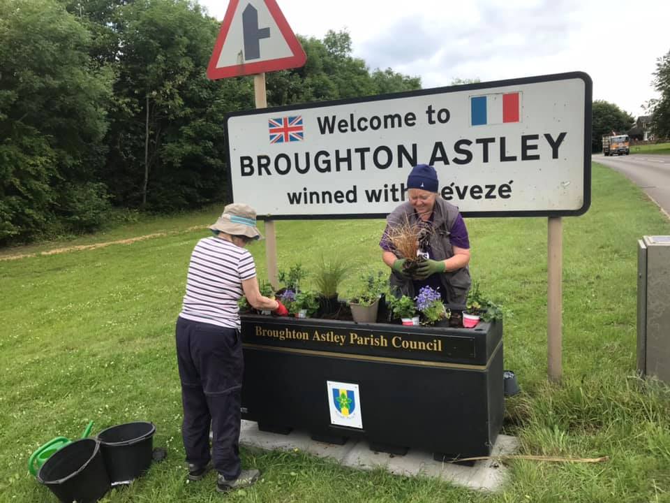 Ladies planting up at gardening social community group